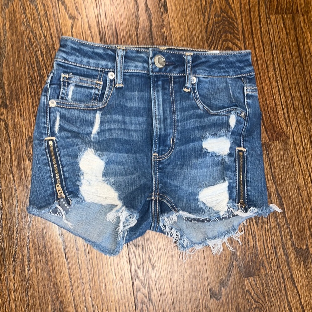 Jean shorts, accent zipper on side, dark blue with rips